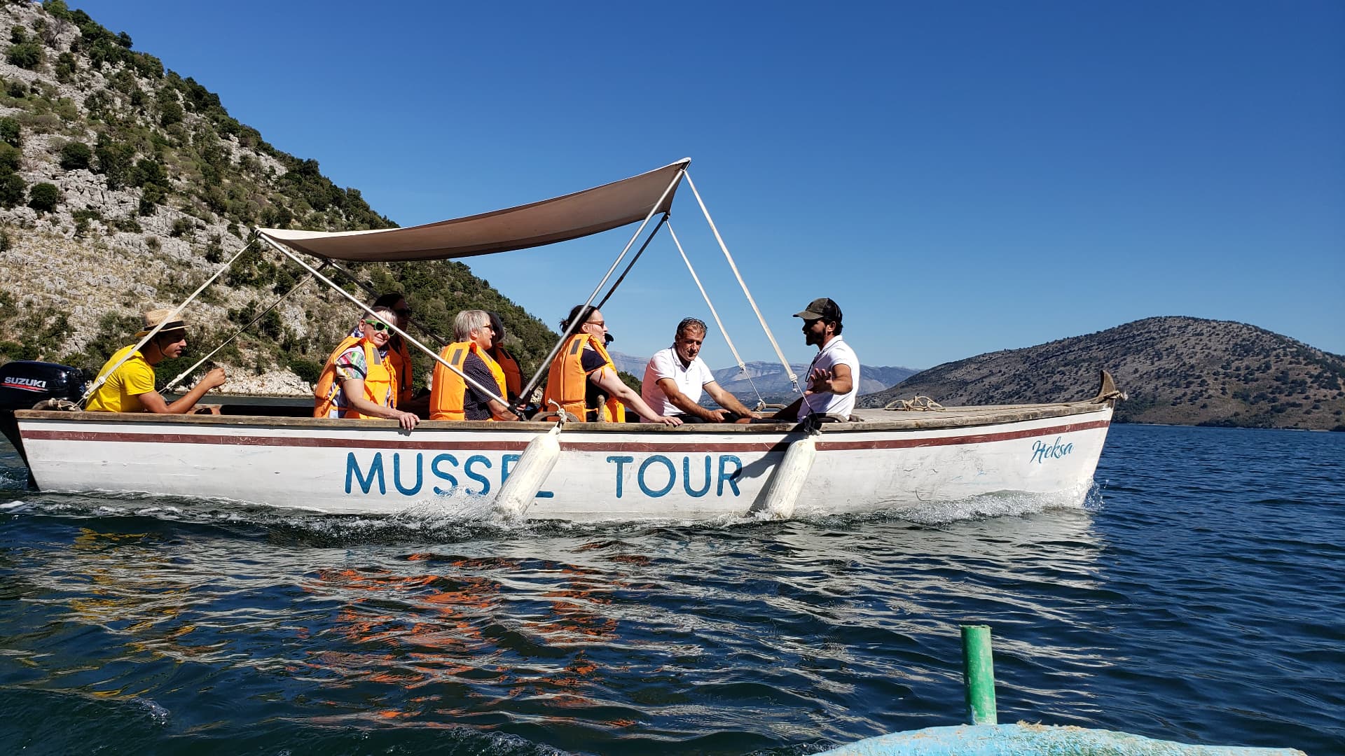 Group of friends enjoying the view over Kotor Bay