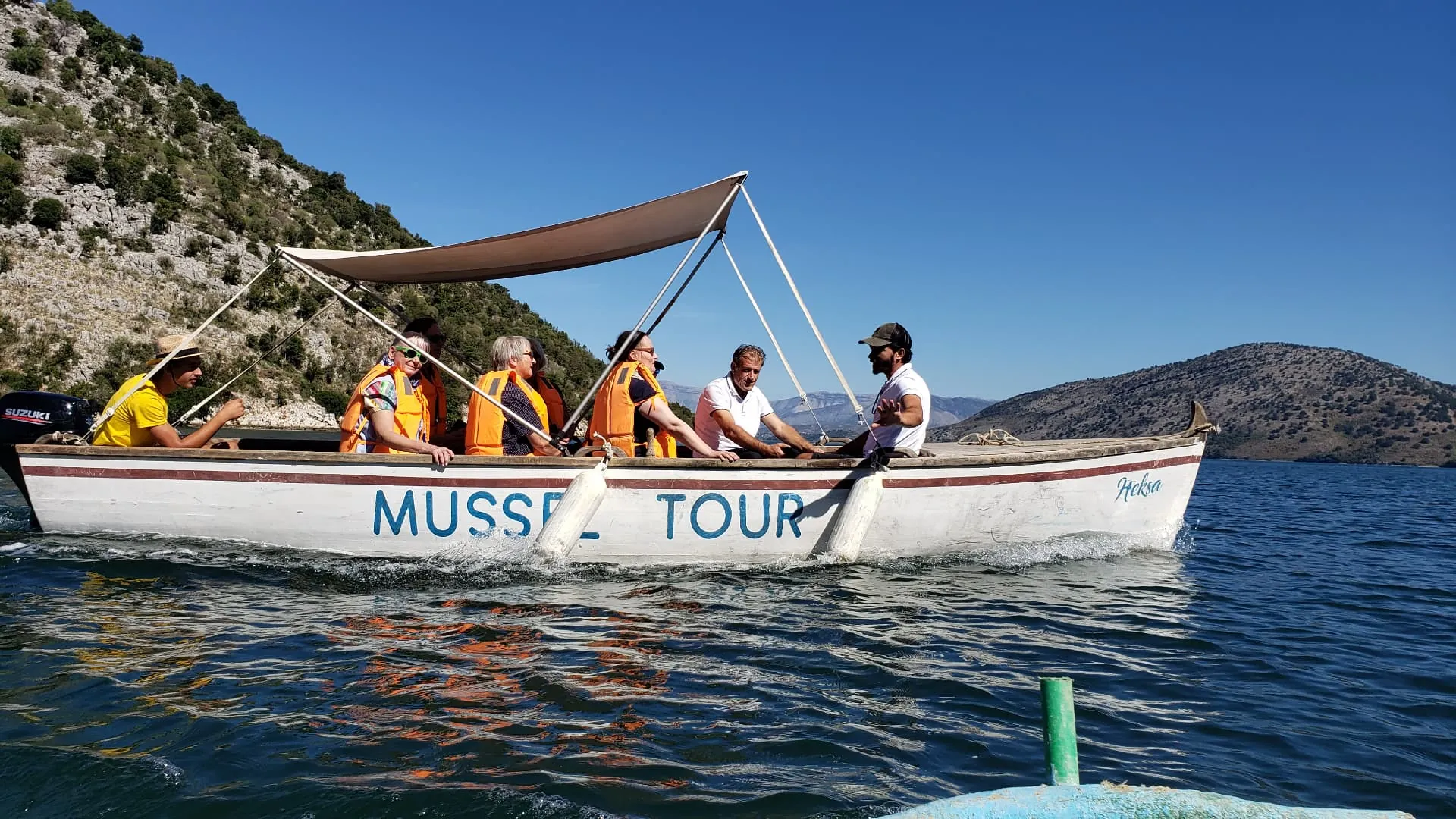 Group of friends enjoying the view over Kotor Bay